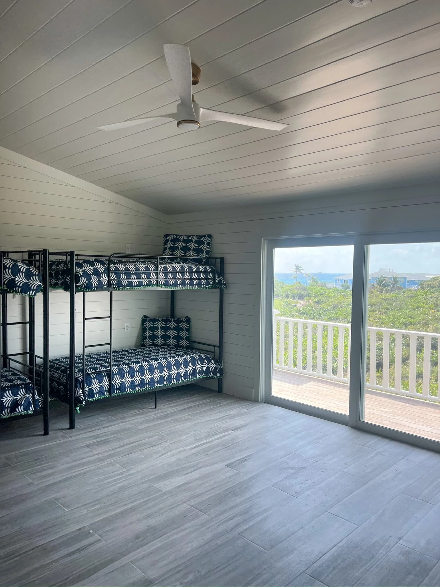 Elbow Cay bedroom and bathroom — luxury custom home in Bahamas
