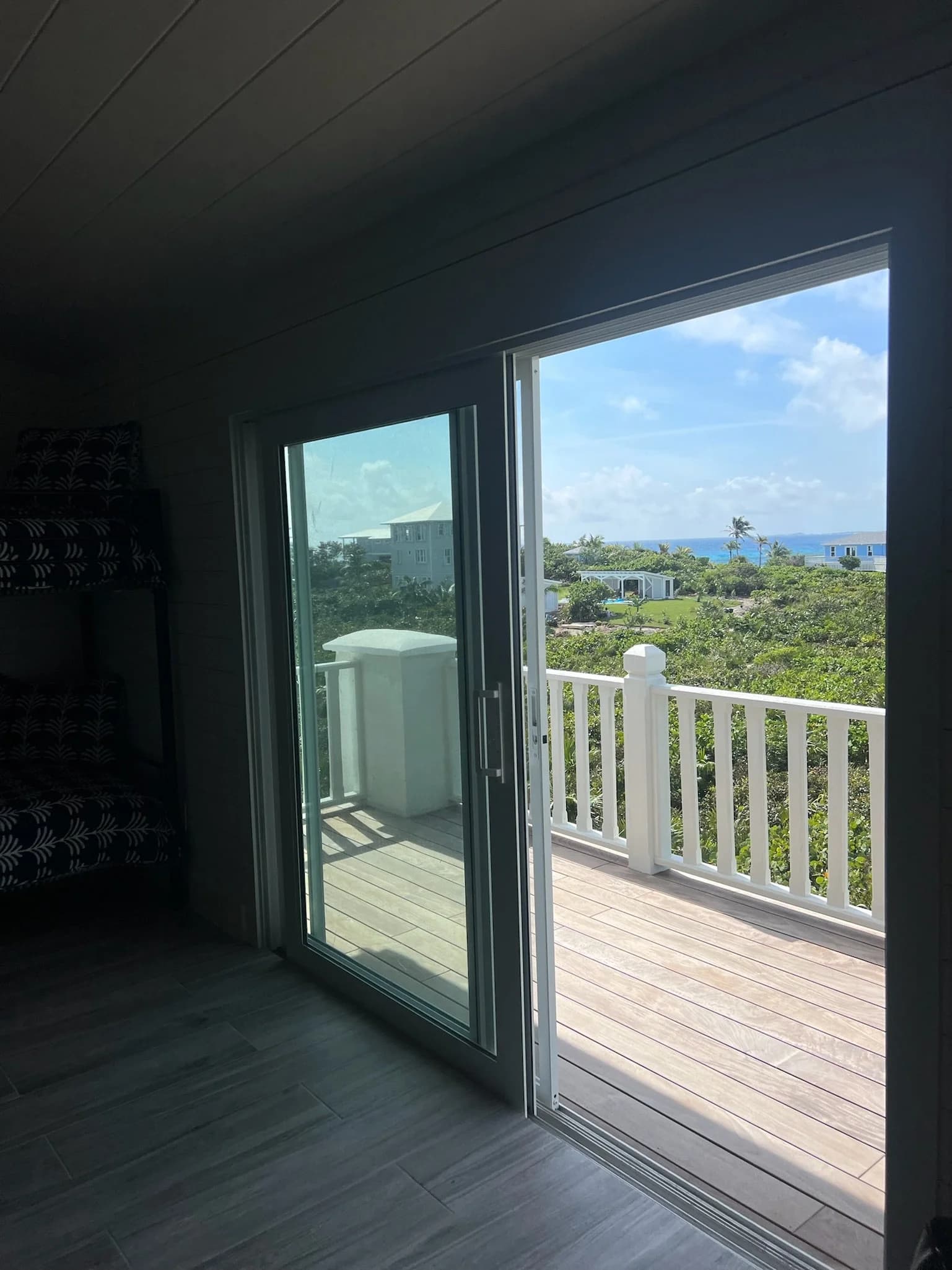 Elbow Cay bedroom and bathroom — luxury custom home in Bahamas