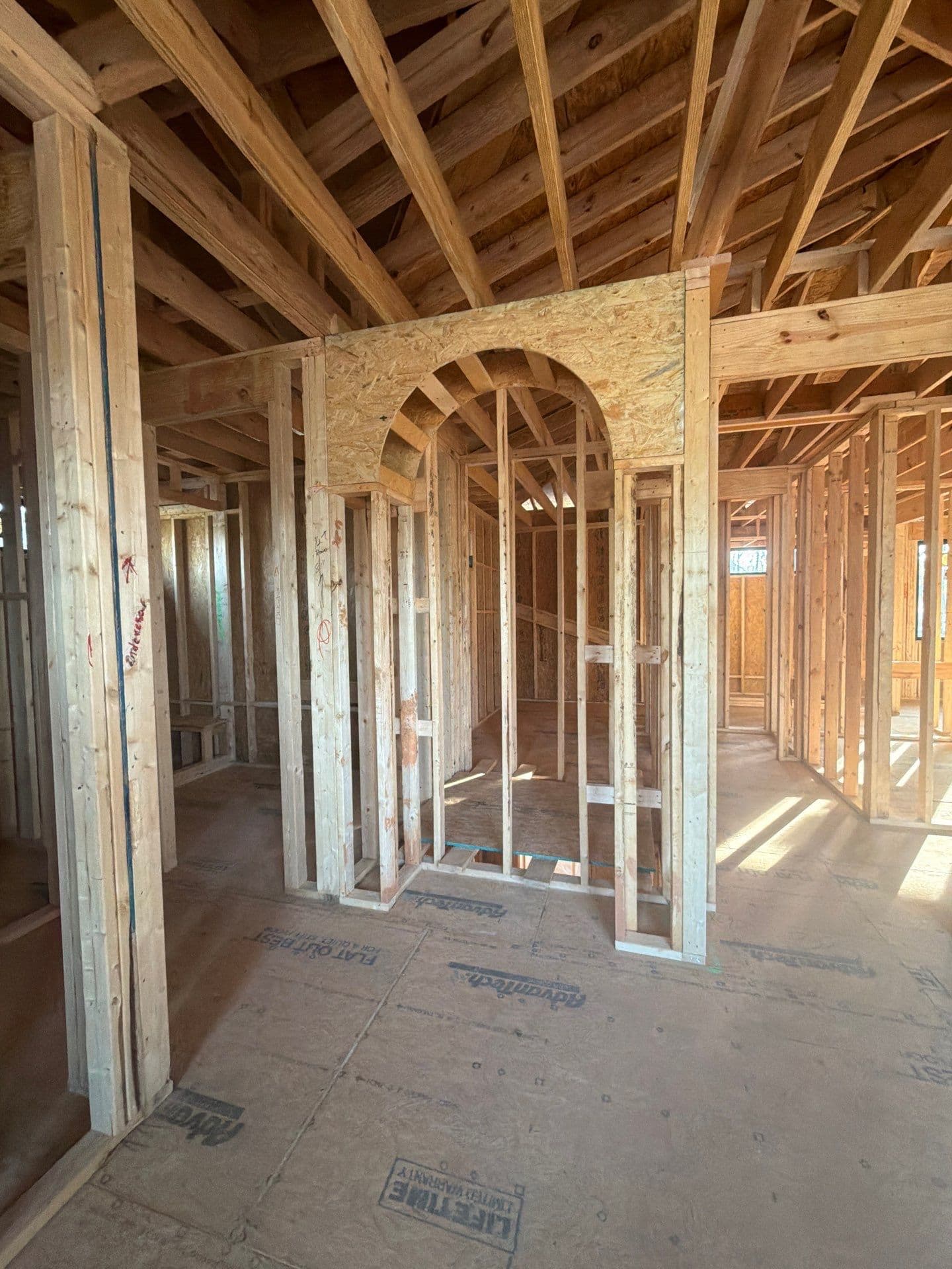 1107 Vision Path arched doorway framing detail — custom architectural craftsmanship by Royal Building Group, Concord NC